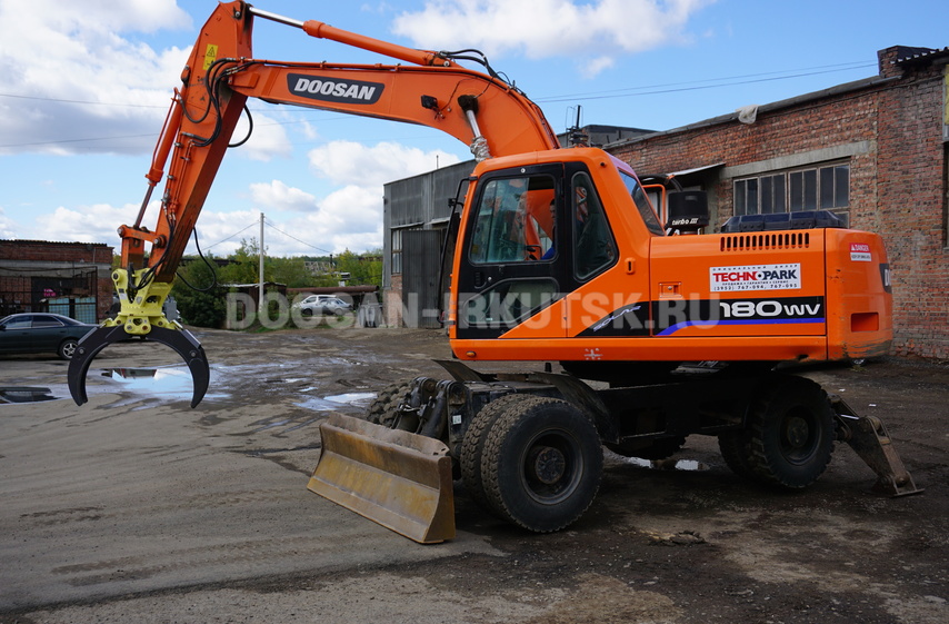 Бревноперегружатель колесный DOOSAN DX 210 WA